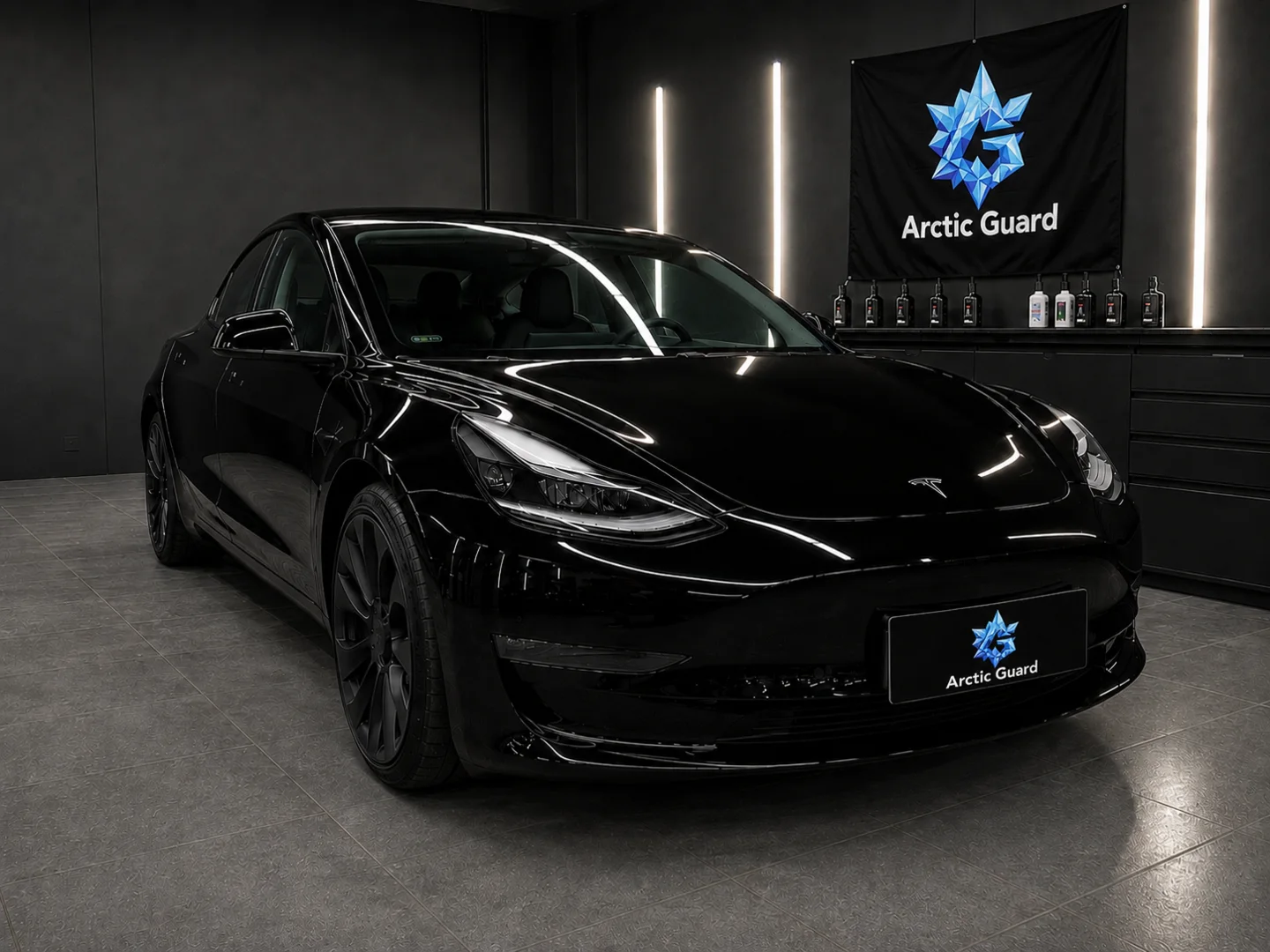 Musta Tesla AutoCare Centerin Arctic Guard -ympäristössä